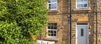 A wonderful stone built cottage located on a quiet row in Clayton West.