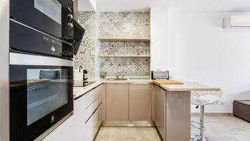 Fridge, microwave, coffee/tea maker, electric kettle