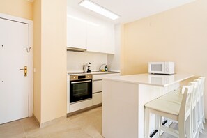 Fridge, microwave, coffee/tea maker, electric kettle