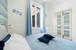 2 bedrooms, soundproofing, iron/ironing board, travel cot