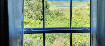Cozy two bedroom home with ocean view. Quiet and secluded location. 