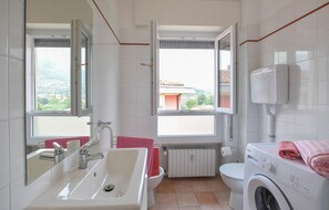 Regadera y secadora de cabello 