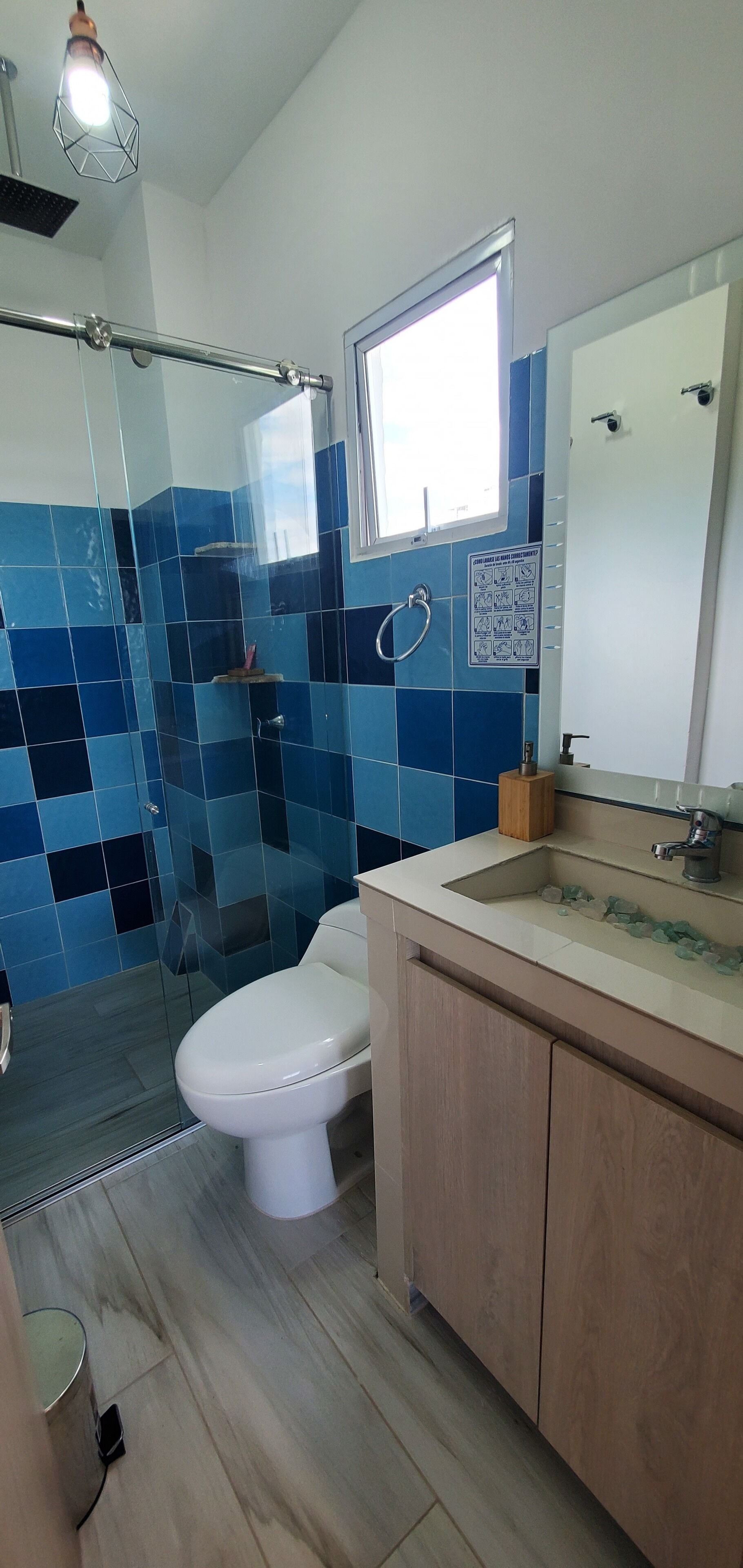 family suite | bathroom | shower, rainfall showerhead, eco-friendly toiletries, hair dryer