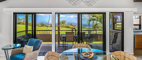 Luxury Condo | Living area | 55-inch Smart TV with digital channels