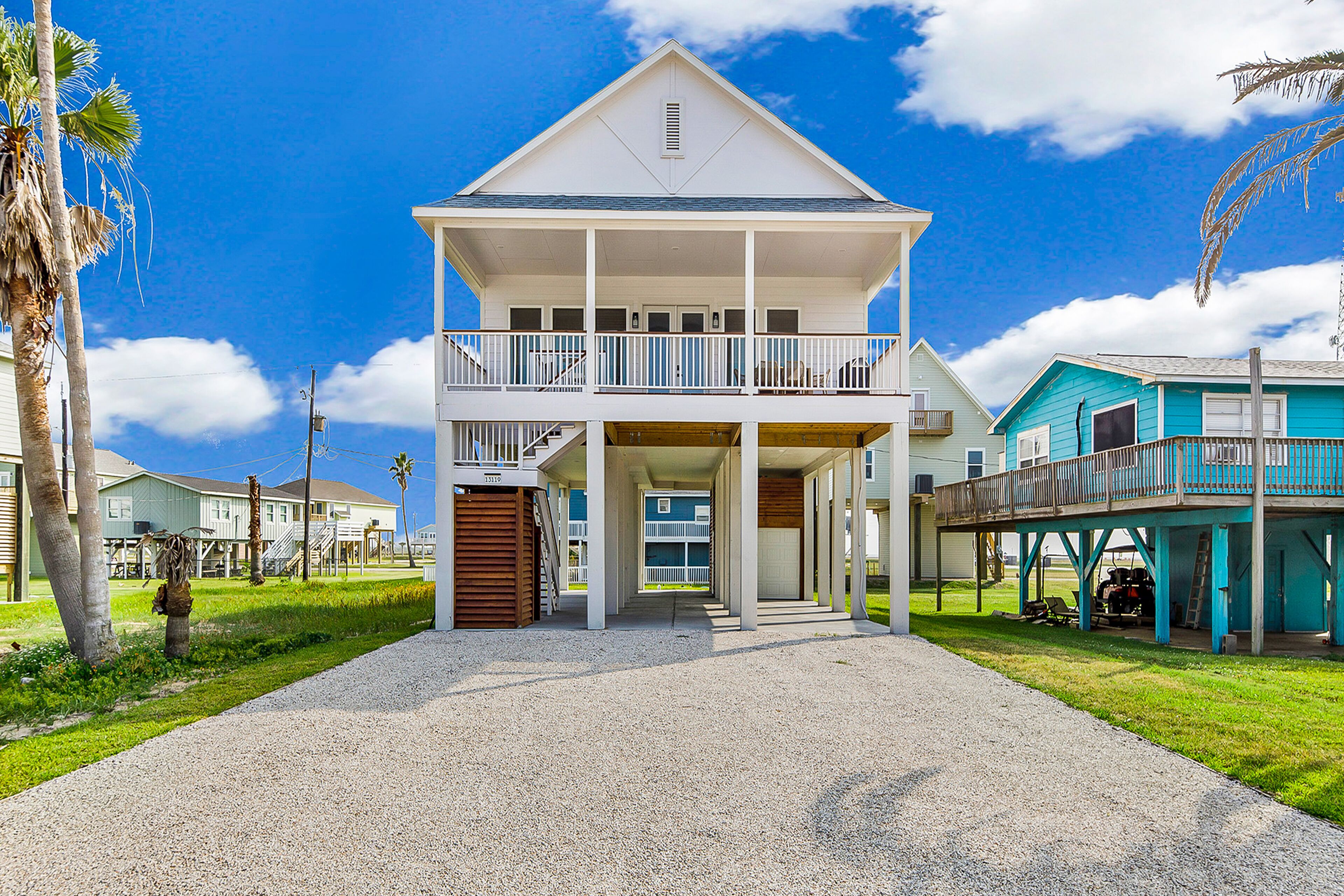 Stylish retreat with a furnished deck, AC, & washer/dryer - walk to the beach
