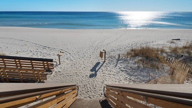 A beach with a wooden boardwalk leading to a sandy beach area. - Private Heated Pool | FREE Golf Cart | 5 BR Home | 5 Outdoor Spaces | Near Dune Allen Beach (Santa Rosa Beach)