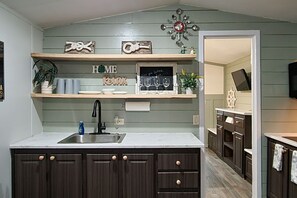 Fridge, microwave, stovetop, coffee/tea maker