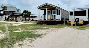 A mobile home with a porch and a Jayco RV parked nearby. - Spectacular bay views with access to Lighted Pier (Port Lavaca)