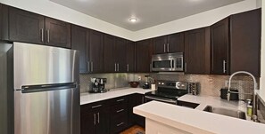 Fridge, microwave, oven, stovetop - The Cornet Nest at Belltown - 99 Walkscore (Seattle)