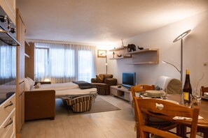 Family apartment plus 200 CHF cleaning fee on top of the rate | Living area