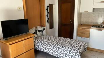 1 dormitorio, tabla de planchar con plancha, cuna de viaje y wifi gratis