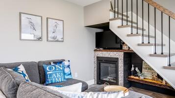 Smart TV, fireplace, books