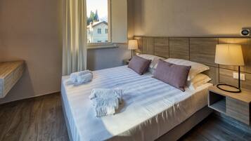 Basic Apartment | Down comforters, desk, laptop workspace, free WiFi