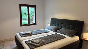 3 多间卧室、免费 WiFi、床单