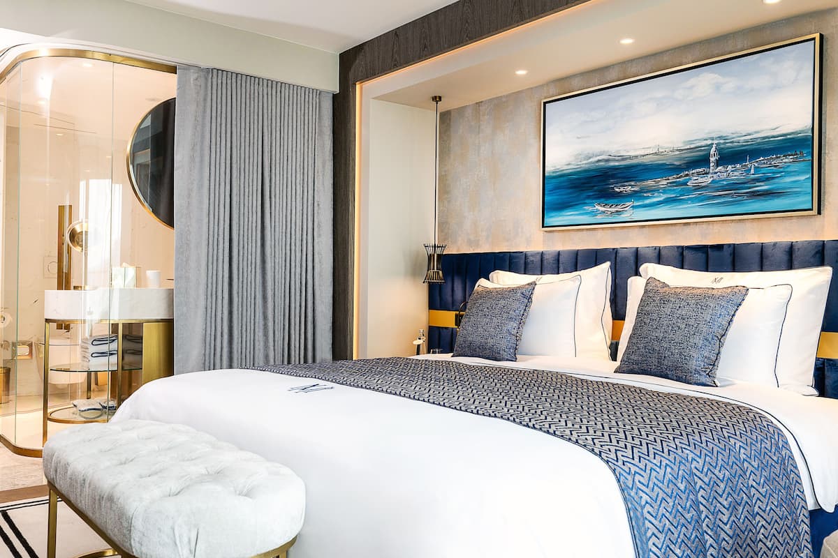 1 kamar tidur, seprai premium, selimut bulu angsa, dan minibar