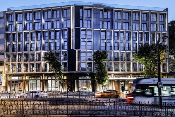 A modern hotel with a grid-like facade, large windows, and a central entrance. - The Maestro Hotel (Istanbul)