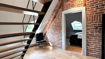 Luxury Penthouse | Living area | 55-inch Smart TV with cable channels, TV