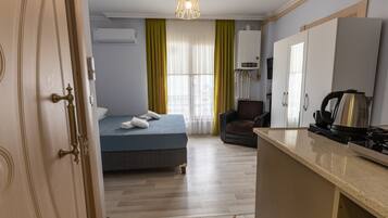 Economy Apartment | Living area | TV