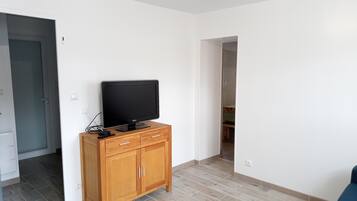 Family Apartment | Living area | 32-inch Smart TV with digital channels