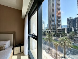 1 غرفة نوم وخزنة داخل الغرفة وستائر تعتيم ومكواة/لوح كي