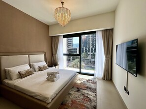 1 غرفة نوم وخزنة داخل الغرفة وستائر تعتيم ومكواة/لوح كي