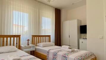 Premium bedding, WiFi (free), bed sheets