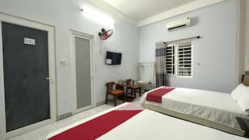 Family Room, 2 Double Beds | 1 bedroom, desk, laptop workspace, free WiFi