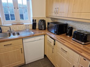 Fridge, microwave, oven, dishwasher - NightRest Homes 6 Bedroom Short & Long Term Stay (Oxley Park)