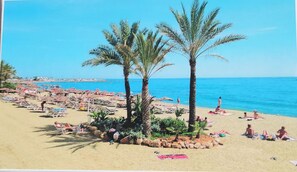 Solsenger og strandhåndklær