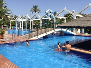 Outdoor pool, a heated pool - Benal Beach. Beautiful penthouse in first line beach.4 people. 5 swimming pools.  (Benalmadena)