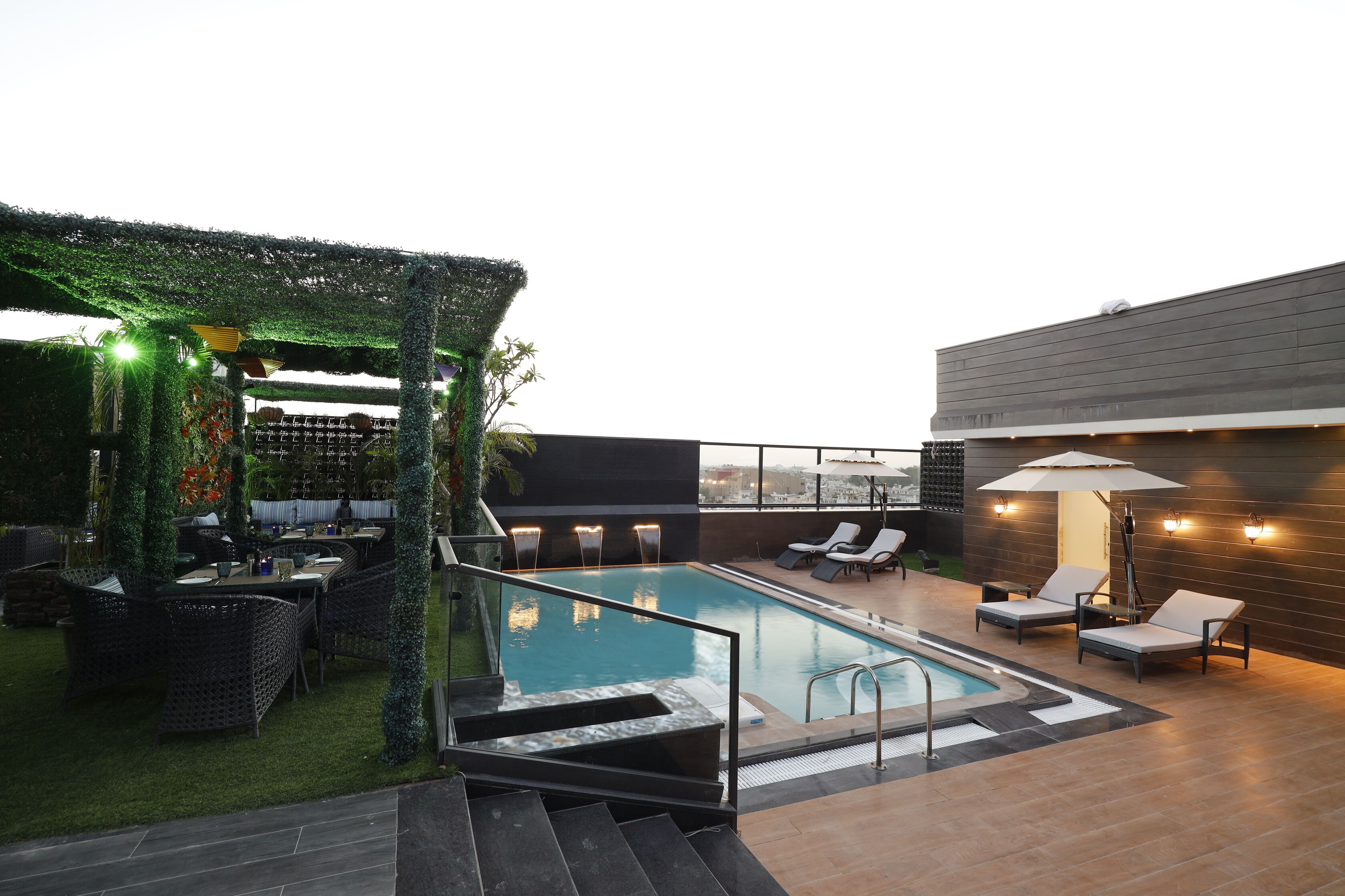 outdoor pool, pool umbrellas, pool loungers