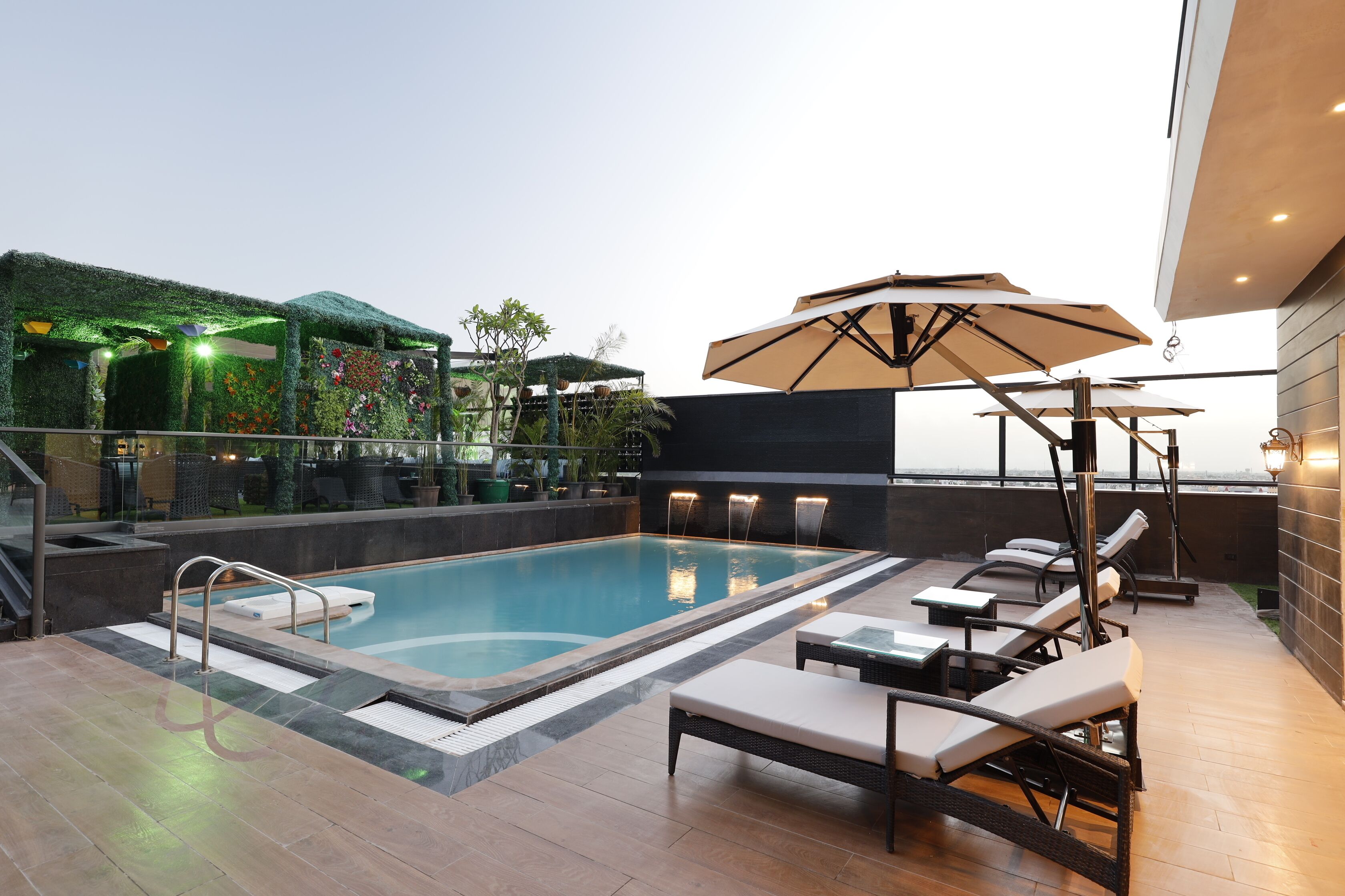 outdoor pool, pool umbrellas, pool loungers