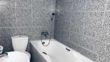 Separate bathtub and shower, rainfall showerhead, free toiletries