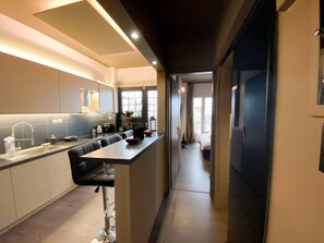 Apartment, Multiple Beds | Private kitchen | Microwave, oven, stovetop, electric kettle - High Standards Apartment Downtown Athina (Athens)