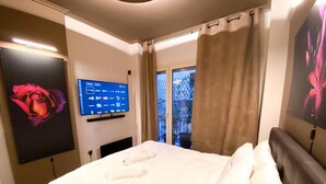Apartamento, várias camas | 1 quarto, ferros/tábuas de passar roupa, Wi-Fi de cortesia