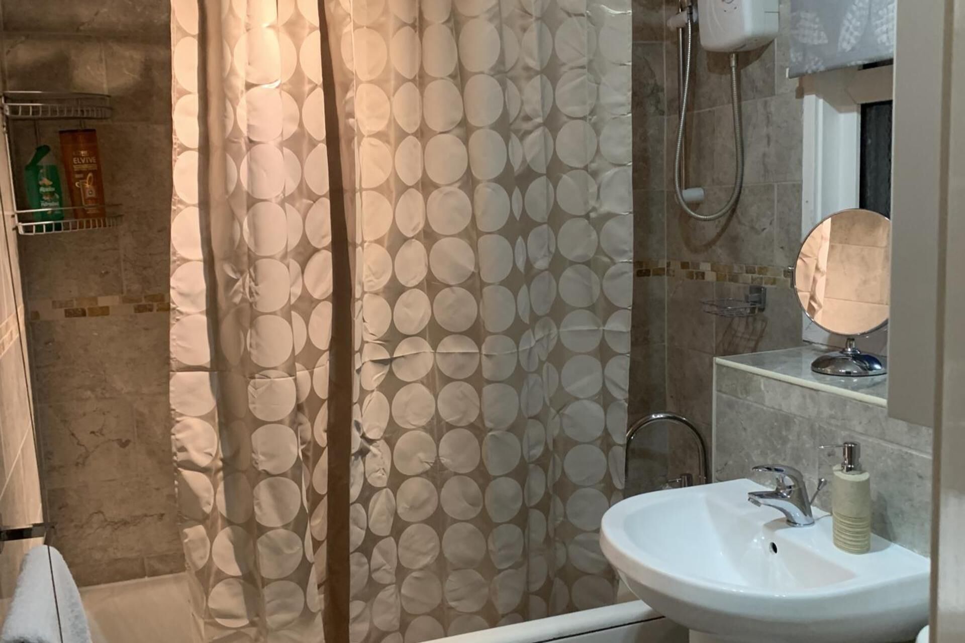 Separate tub and shower, deep soaking tub, towels
