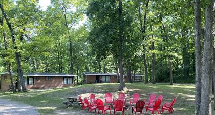 Rustic cabins in secluded campground with lake access and woods to wander in.