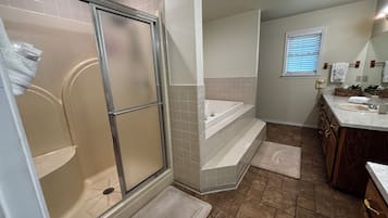 Shower, jetted tub, hair dryer, towels