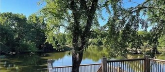 Relax at spacious 4 bedroom private lake home in Chaffee Crossing!