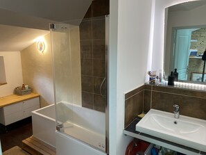 Shower, hair dryer, towels, soap