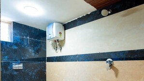 Suite Familiale, plusieurs lits, vue ville | Salle de bain