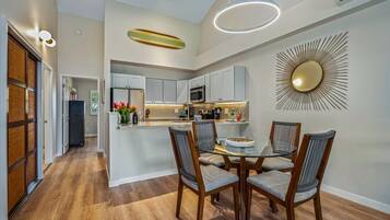 Luxury Condo | Private kitchen | Full-size fridge, microwave, oven, stovetop