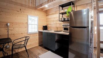 Fridge, coffee/tea maker, toaster, cookware/dishes/utensils