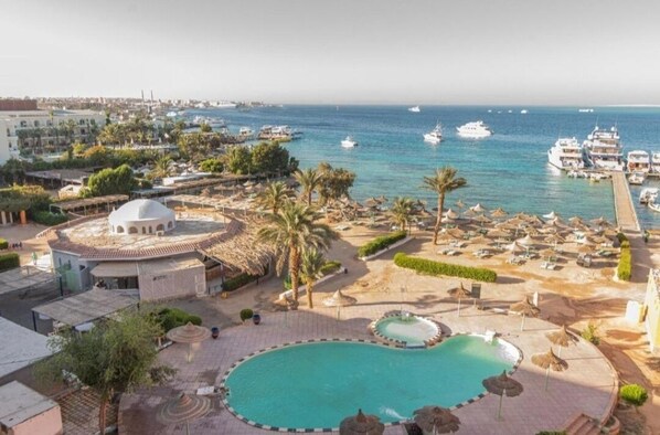 2 outdoor pools, pool umbrellas, pool loungers