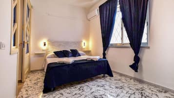 6 habitaciones, tabla de planchar con plancha y cuna de viaje