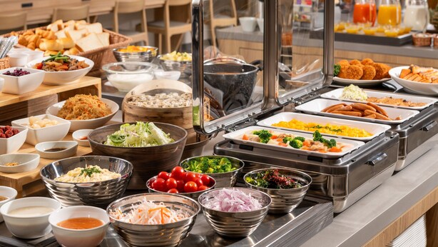 A buffet with various food items and condiments. - HOTEL MYSTAYS Atsugi (Atsugi)