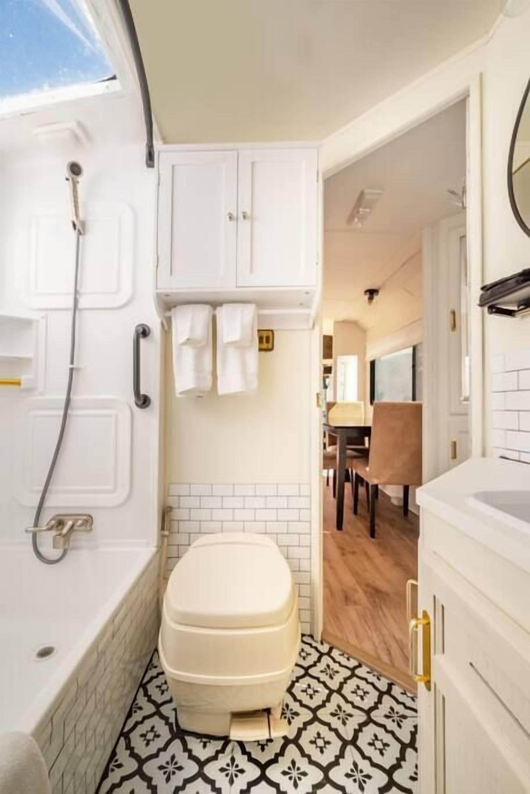 Bathtub, hair dryer, towels