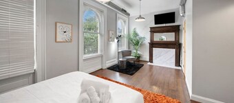 City Escape 2BR Steps to TQL | OTR | Downtown