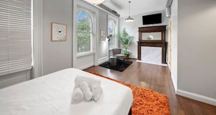 City Escape 2BR Steps to TQL | OTR | Downtown