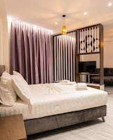 Deluxe Suite | Premium bedding, desk, laptop workspace, free WiFi